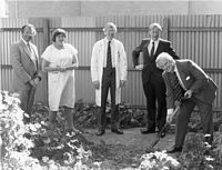 Bernard OBrien turns the first sod of new microsurgery building in 1983. Dr Keith Henderson is immediately behind him. Used with the permission of the Bernard OBrien Institute of Microsurgery.
