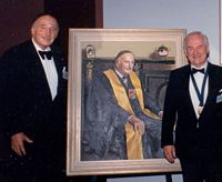 Weary Dunlop and Bernard OBrien with Dunlops portrait. Used with the permission of the Bernard OBrien Institute of Microsurgery.