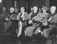 Conferring LDSRCS (England) at RACS, Melbourne c.1940. (l-r) Prof. Arthur Amies, Dr Acting Prof. W.T. Tuckfield, unknown academic, Prof. C. Harold Down, Dr J Monahan Lewis - courtesy The Age.